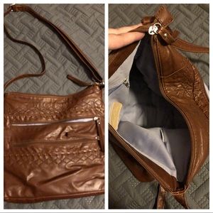 Brown leather crossbody purse.
